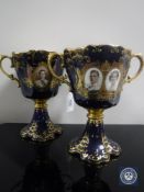 Two commemorative Aynsley porcelain twin-handled goblets,