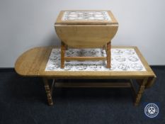 Two continental oak tiled topped drop leaf coffee tables
