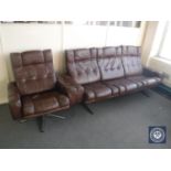 A mid 20th century brown button leather three seater settee and armchair