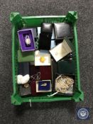 A basket containing assorted costume jewellery and simulated pearls