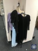 A vintage dress maker's dummy on stand plus a small quantity of vintage clothing