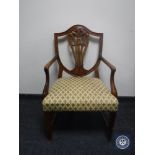 A 20th century Hepplewhite style armchair