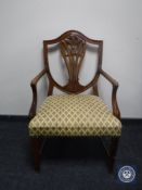 A 20th century Hepplewhite style armchair