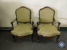 A pair of antique armchairs in Regency stripe fabric