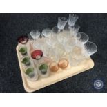 A tray of assorted drinking glass