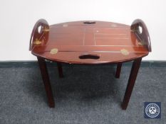 A mahogany butler's tray on stand