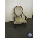 An antique mahogany spoon back bedroom chair