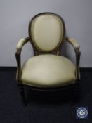 A continental salon armchair in gold fabric