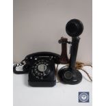 An early 20th century candlestick telephone with later earpiece,