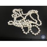 A cultured pearl two-strand necklace on silver clasp
