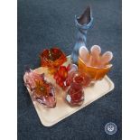 A tray of six coloured studio glass vases and bowls