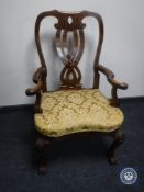 An early 20th century Queen Anne style armchair