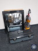 A Dyson DC24 vacuum together with two framed mirrors and tool box containing cassettes,