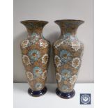 A pair of Royal Doulton Lambeth ware vases, height 41.