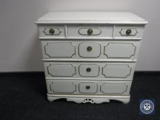 An early 20th century painted pine four drawer chest