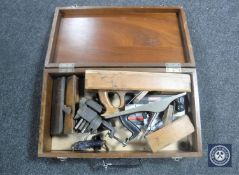 A joiner's tool box of assorted wood-working planes, metal clamp,