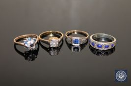 A 9ct gold sapphire and diamond cluster ring (two diamonds deficient), a sapphire solitaire ring,