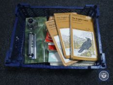 A basket of ordnance survey maps and an onyx desk stand