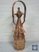 An antique arts and crafts copper lantern