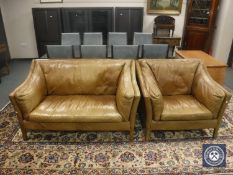A tan leather Reggio two seater settee by Halo, width 149 cm, together with the matching armchair,