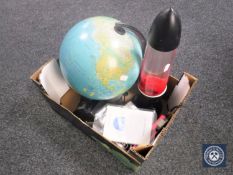 A box of globe on stand, lava lamp,