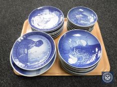 A tray containing thirty-five Royal Copenhagen and Bing & Grondahl plates of the Year