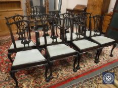 A set of eight carved mahogany Chippendale style dining chairs,