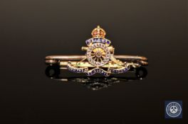 An enamel and diamond set Royal Artillery brooch