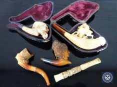 Four Meerschaum pipes, two in cases,
