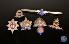 A group of silver and enamelled military brooches including Royal Artillery, Fleet Air Arm,