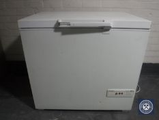 A Siemens chest freezer together with a microwave
