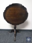 A Victorian mahogany pie crust edge wine table