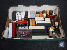 A box of unboxed die cast vehicles - busses and delivery vans