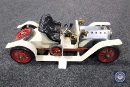 A Mamod vintage motor car and a box of solid fuel tablets