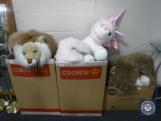 Three boxes containing a quantity of soft toys