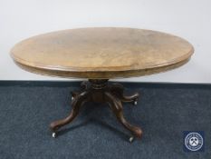 A Victorian oval figured walnut breakfast table