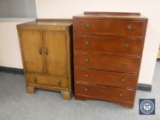 A mid 20th century oak linen cupboard and a five-drawer chest