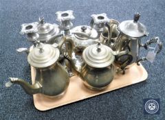 A tray of assorted 20th century plated wares including five assorted tea and coffee pots, tankard,