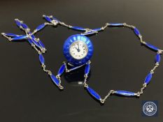 An early 20th century continental silver and guilloche enamel pendant ball watch on matching chain