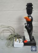 A Carlton ware hand-painted penguin table lamp