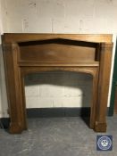 An early 20th century oak fire surround