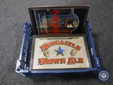 A basket of six framed picture mirrors - Newcastle Brown Ale, Grolsch,