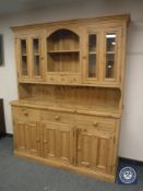 A pine kitchen dresser, width 163 cm.