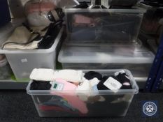 Four plastic storages crates of handbags, glasses cases,