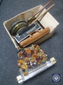 An electric fire with coloured glass coals together with a box containing two bed warming pans,