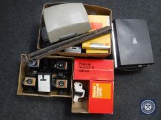 Three boxes of assorted Polaroid cameras and accessories, Kodak printer paper etc,