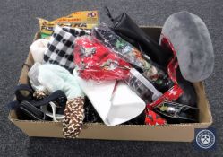A box containing hand bags, scarves,