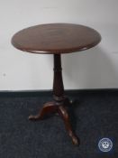 A Victorian mahogany pedestal occasional table