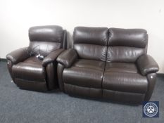 A brown leather two seater settee and matching reclining armchair