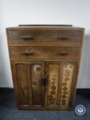 A 20th century oak linen chest
